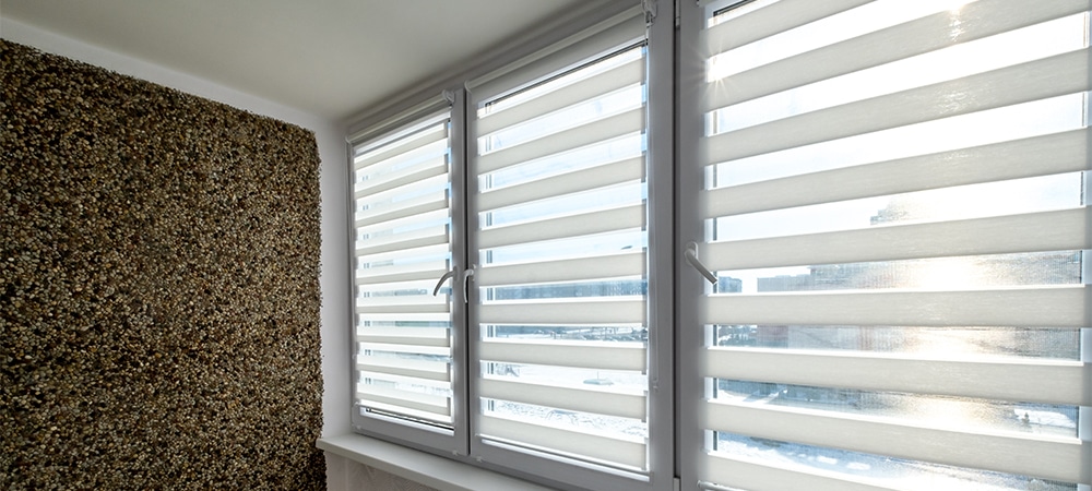 modern white zebra roller blinds on window