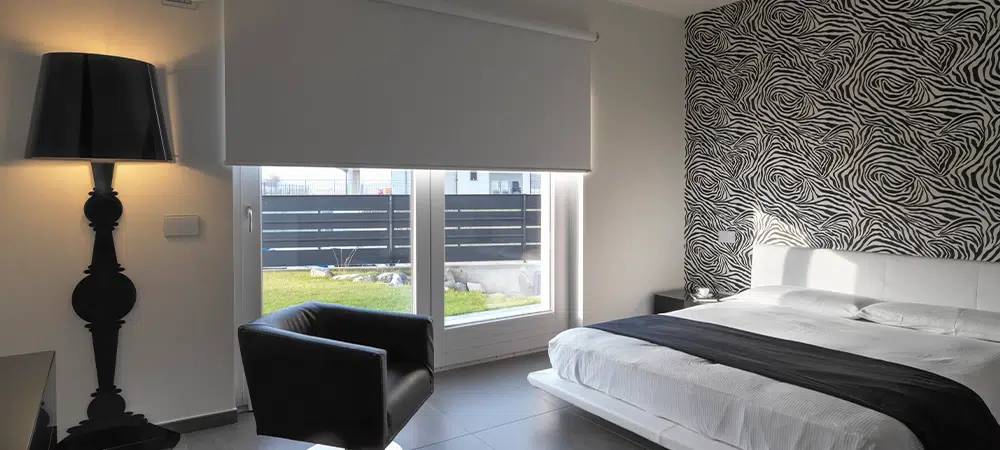 Modern Bedroom Interior with Patterned Wall and Furniture