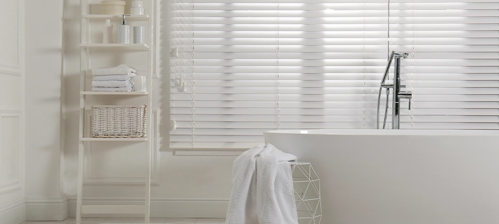 Minimal bathroom interior with modern white tub