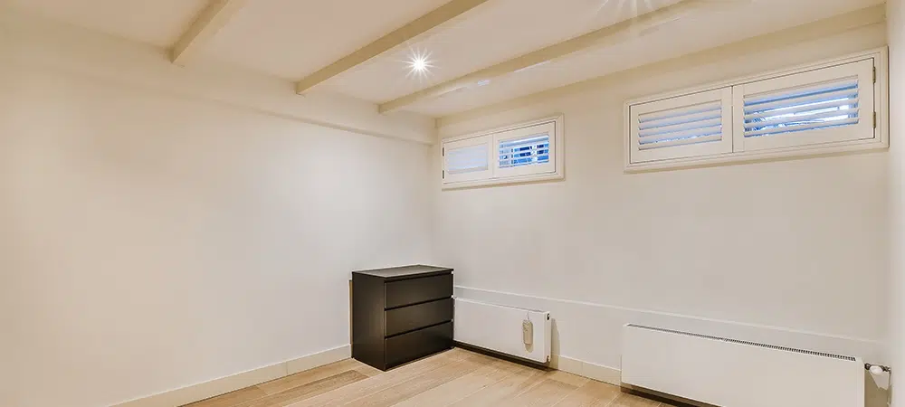 Interior Room with Wooden Floors and Black Dresser