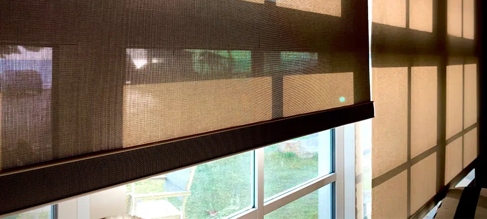Modern blinds traditional home decoration. Sunlight coming through blinds by the window. Curtain at a window overlooking the highest Building of downtown outside.
