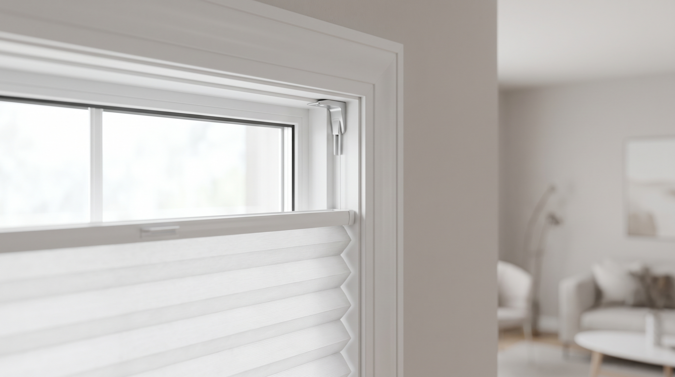 Cordless honeycomb cellular shade held inside a window frame with a damage-free tension bracket, no screws
